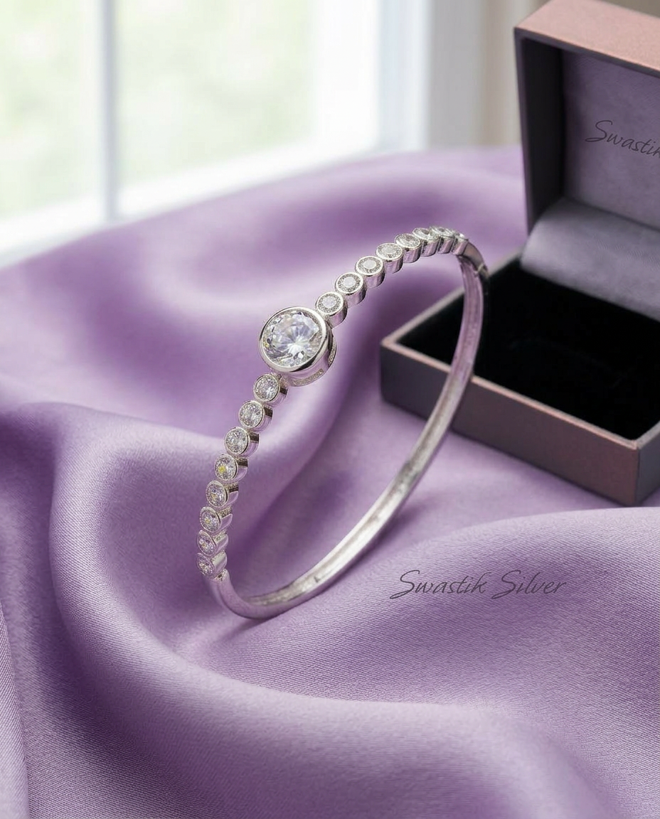 Stellar Halo Graduated Bezel CZ Silver Bracelet