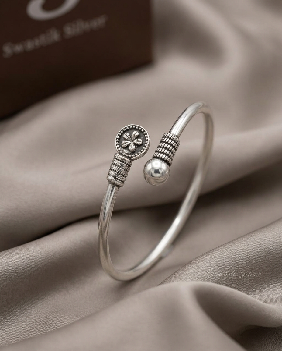 The Vintage Blossom Coin Handcrafted Silver Bypass Cuff