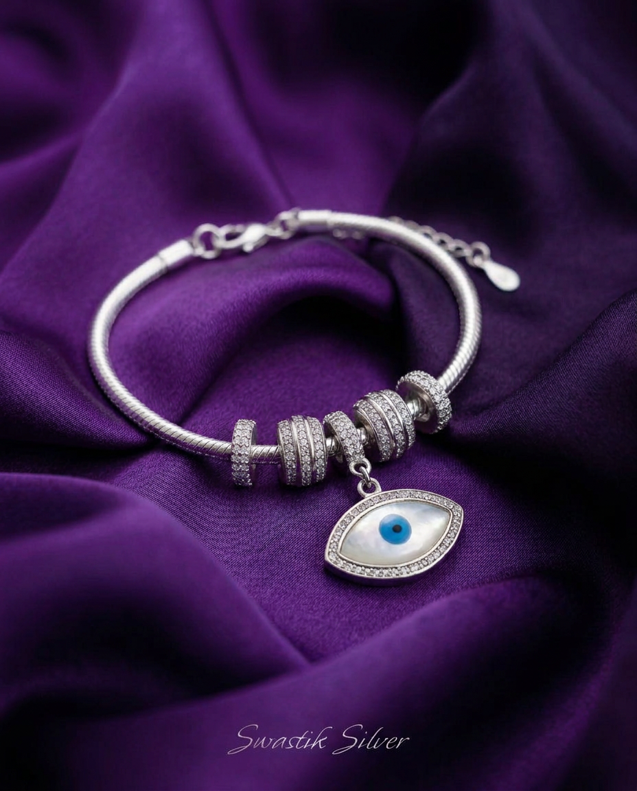 The Nazar Mother of Pearl Evil Eye Silver Charm Bracelet